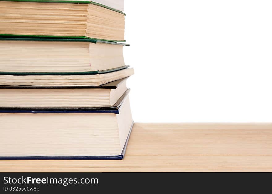 Pile of old books isolated on white background