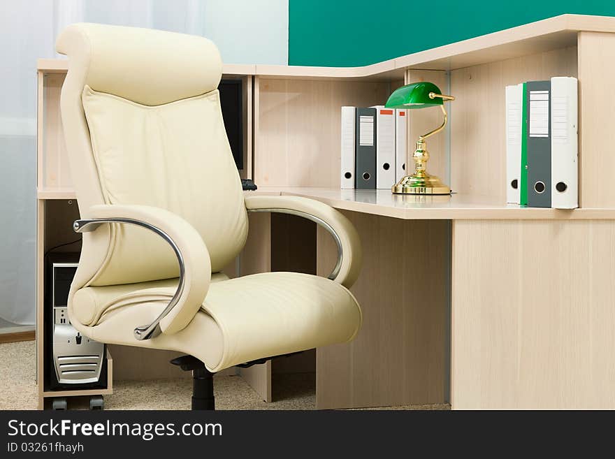 White leather armchair in a modern office