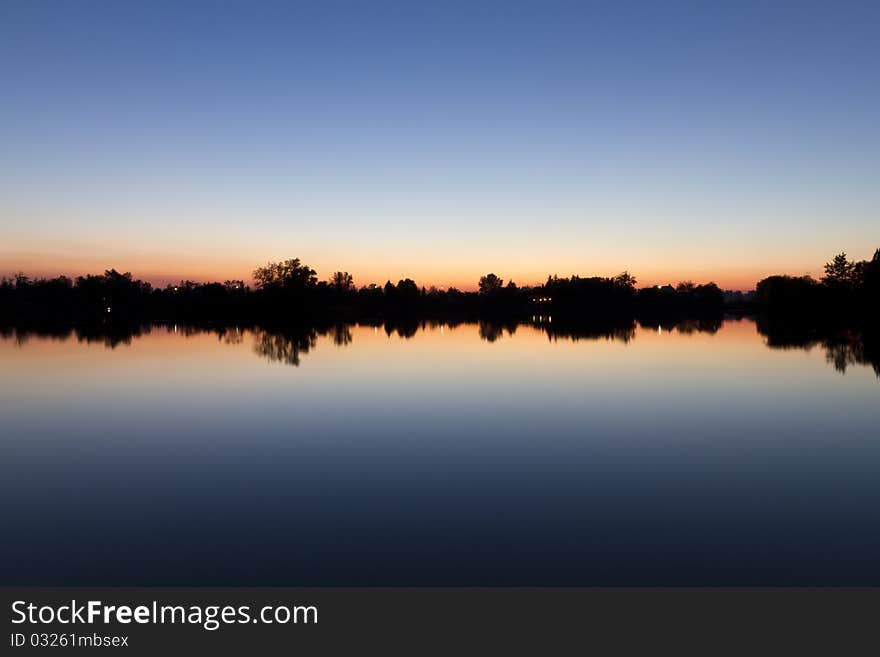 Sunset at the lake coast