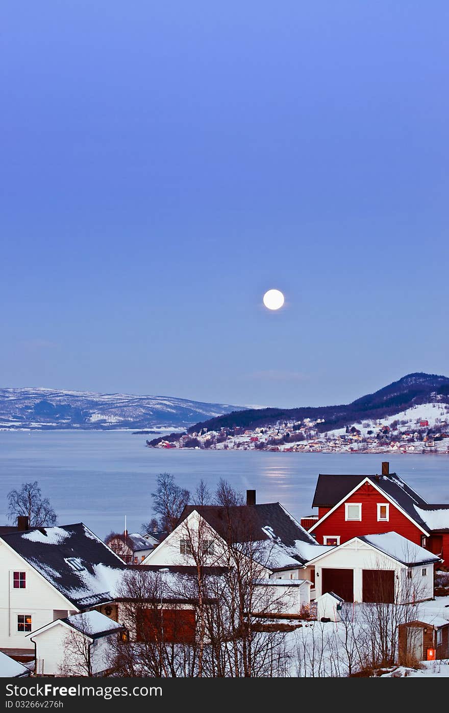 Moon over Finsnes. Norwegian winter landscape. Moon, the polar night.