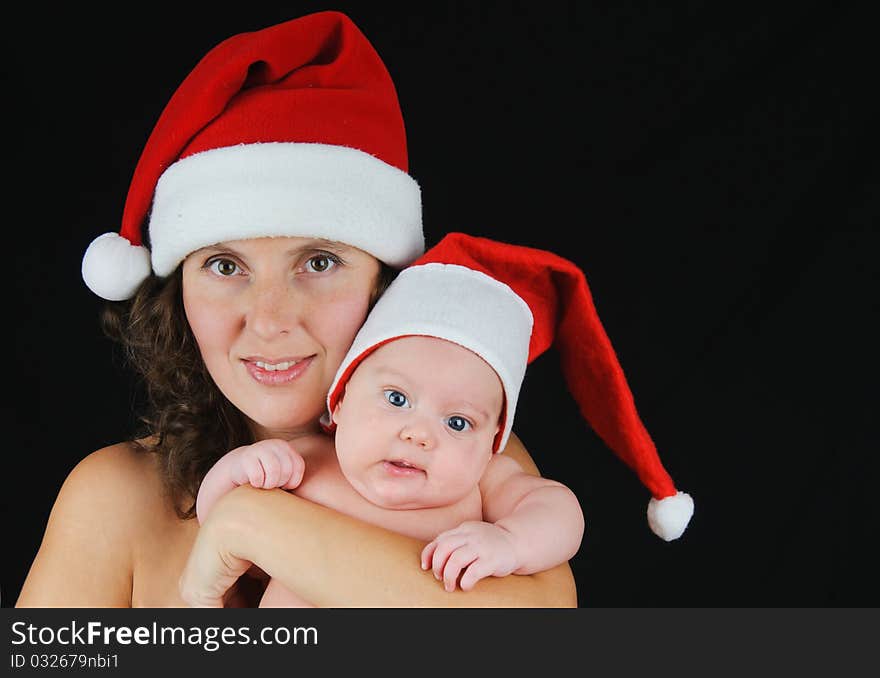 Beautiful Mommy Santa And Her Baby Santa Boy