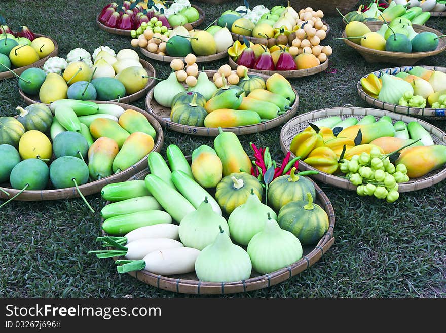 Vegetables fruit Thai model in the threshing basket on the lawn. Vegetables fruit Thai model in the threshing basket on the lawn