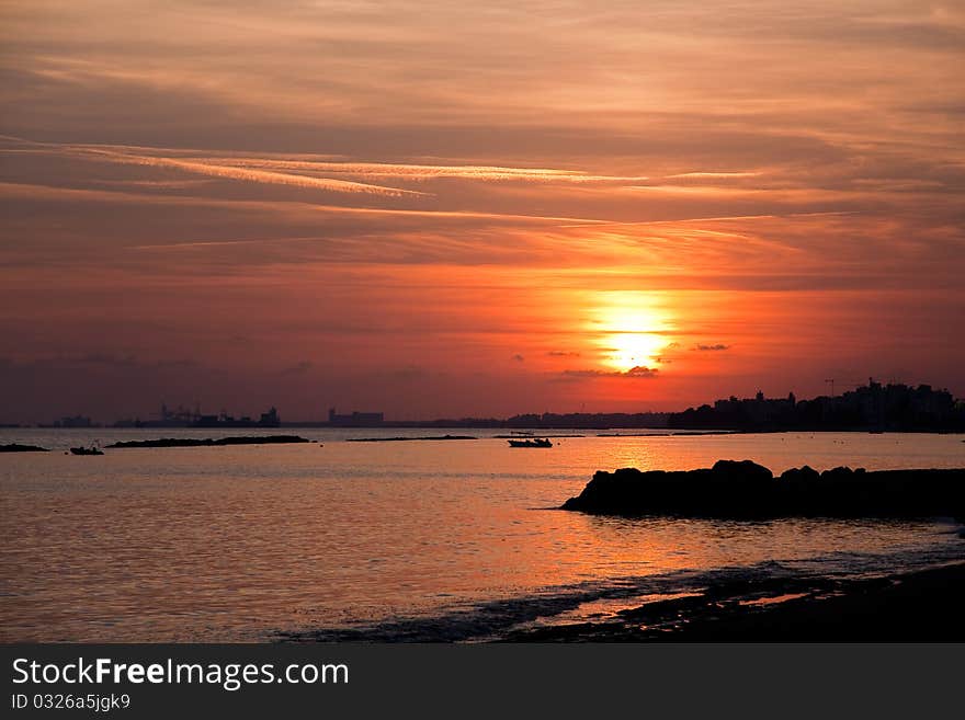 A fishing boat sunset at beach in Cyprus . A fishing boat sunset at beach in Cyprus .