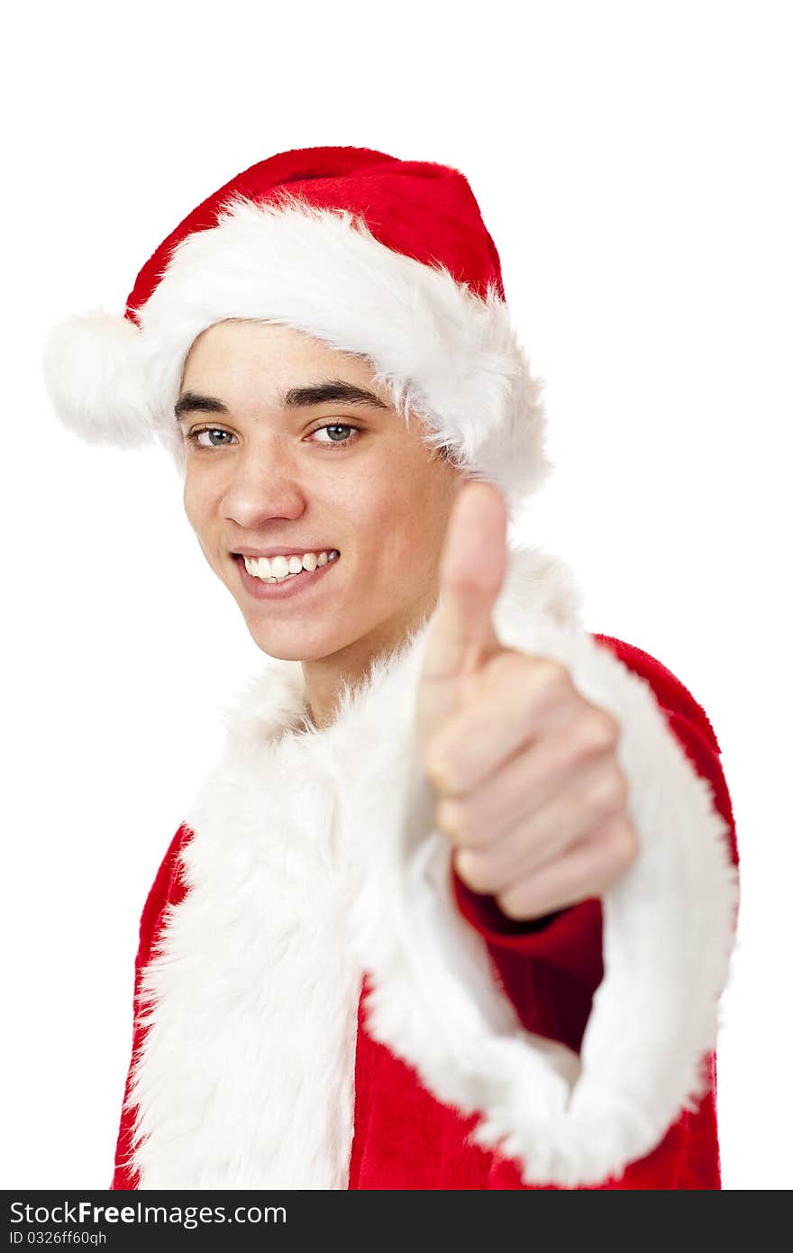 Smiling male santa claus teenager shows thumb up. Isolated on white background.