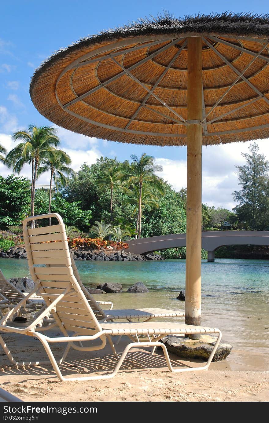 A Beach Chair Ready For Tanning And Relaxation