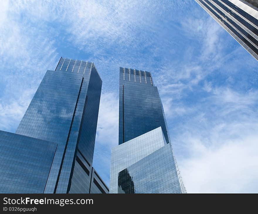 Glass reflecting skyscrapers