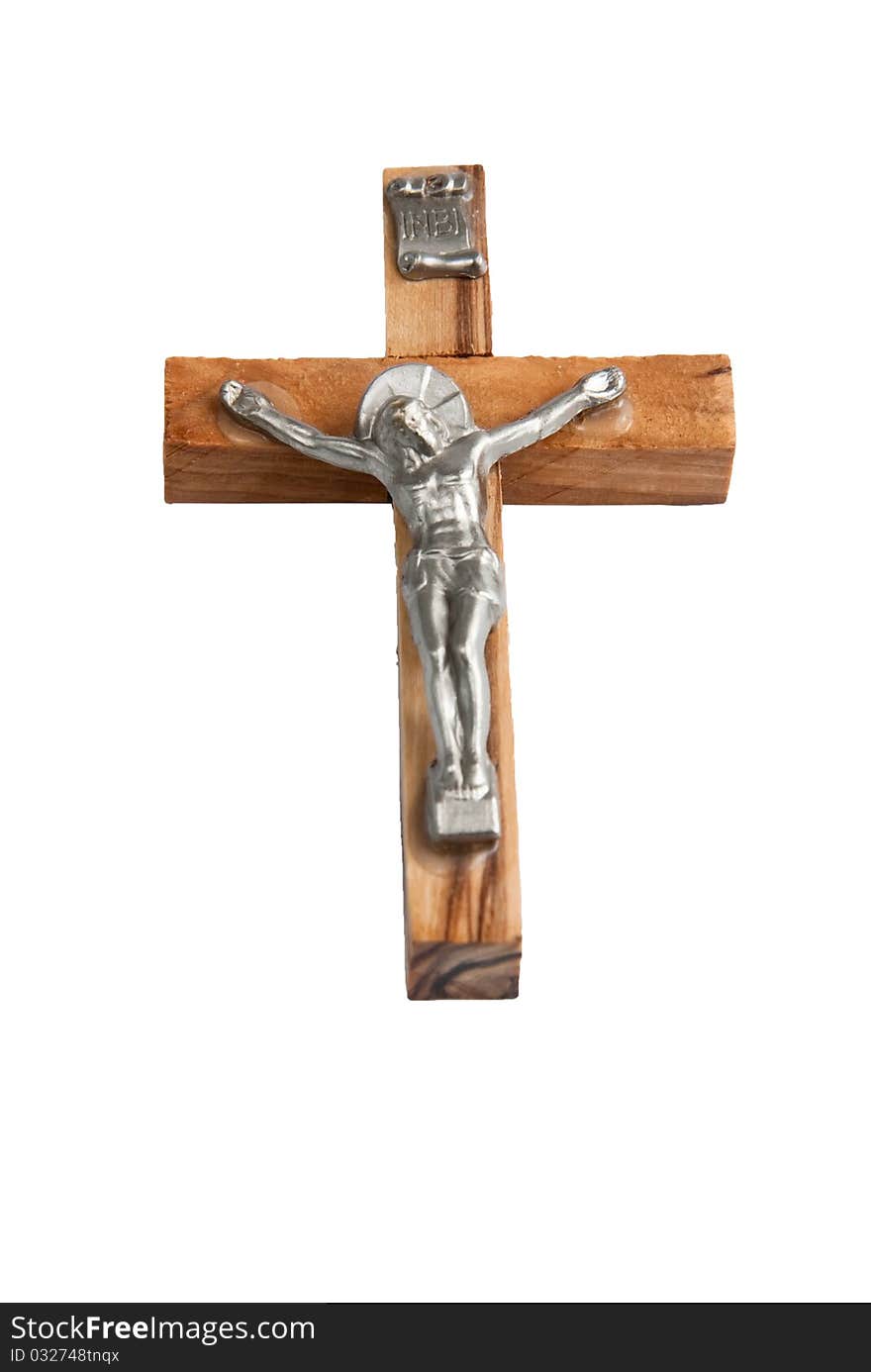 Wooden cross with Jesus on a white background