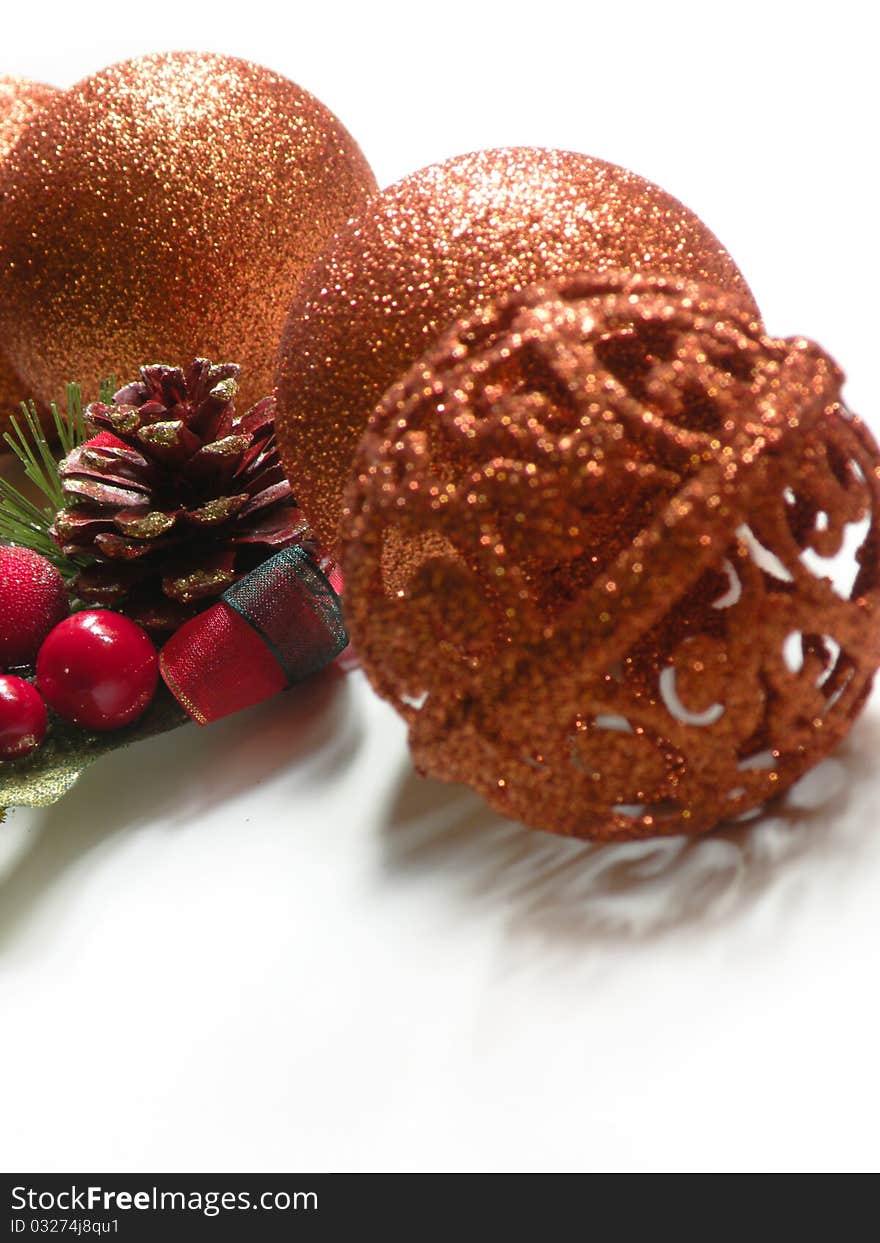 Christmas themed with evergreen tree branch, holly, and decorated ornament. Christmas themed with evergreen tree branch, holly, and decorated ornament.