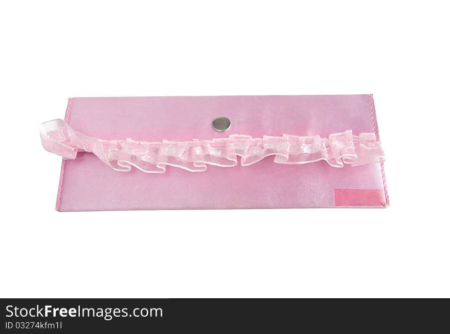 Children's pink purse with a lace on a white background. Children's pink purse with a lace on a white background