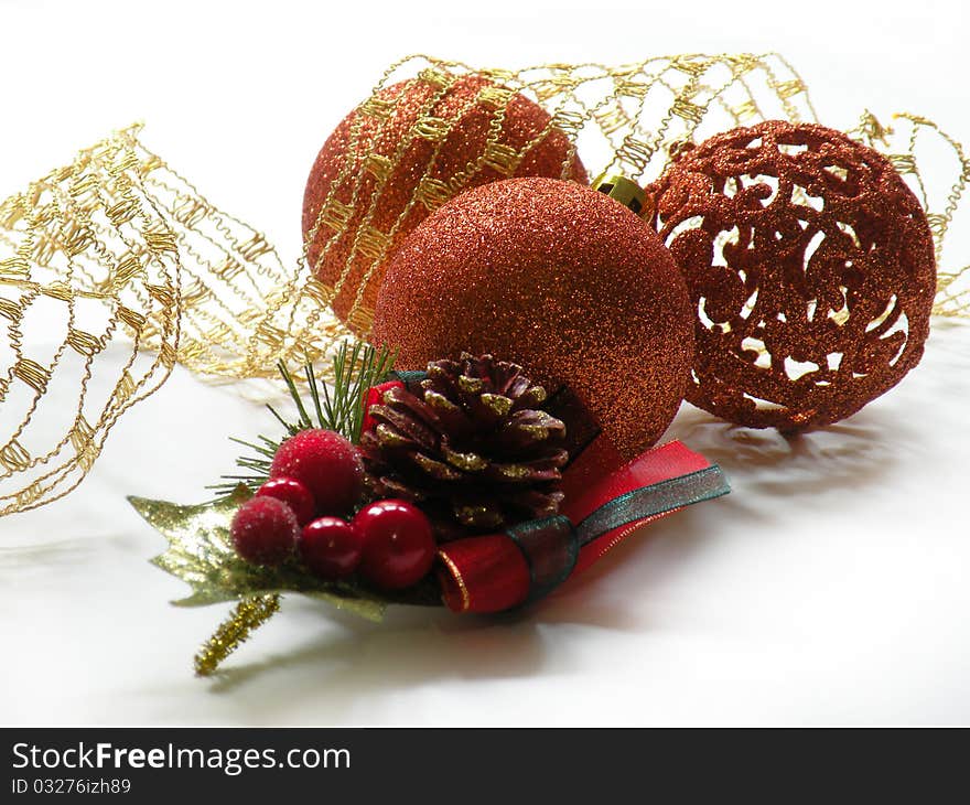 Christmas themed with evergreen tree branch, holly, and decorated ornament. Christmas themed with evergreen tree branch, holly, and decorated ornament.