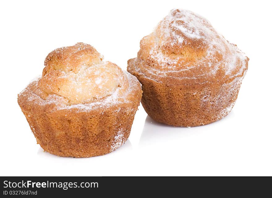 Two muffins isolated on white background