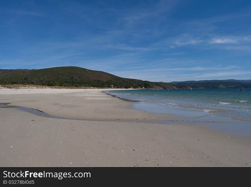 The beach in Finisterre, Spain. The beach in Finisterre, Spain