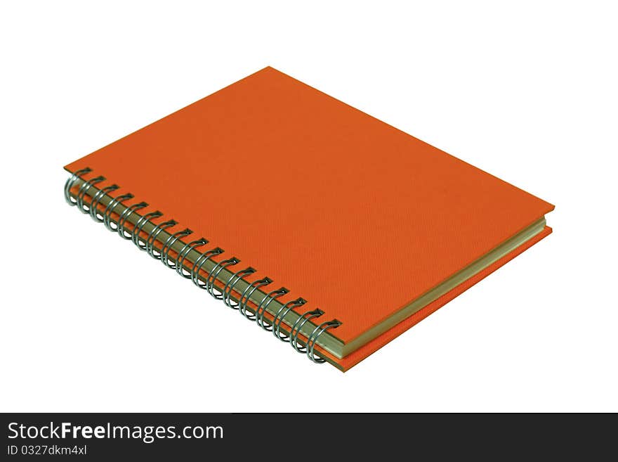 Orange note book on the white background