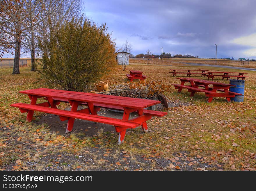 High dynamic range of some red picnic tables. High dynamic range of some red picnic tables