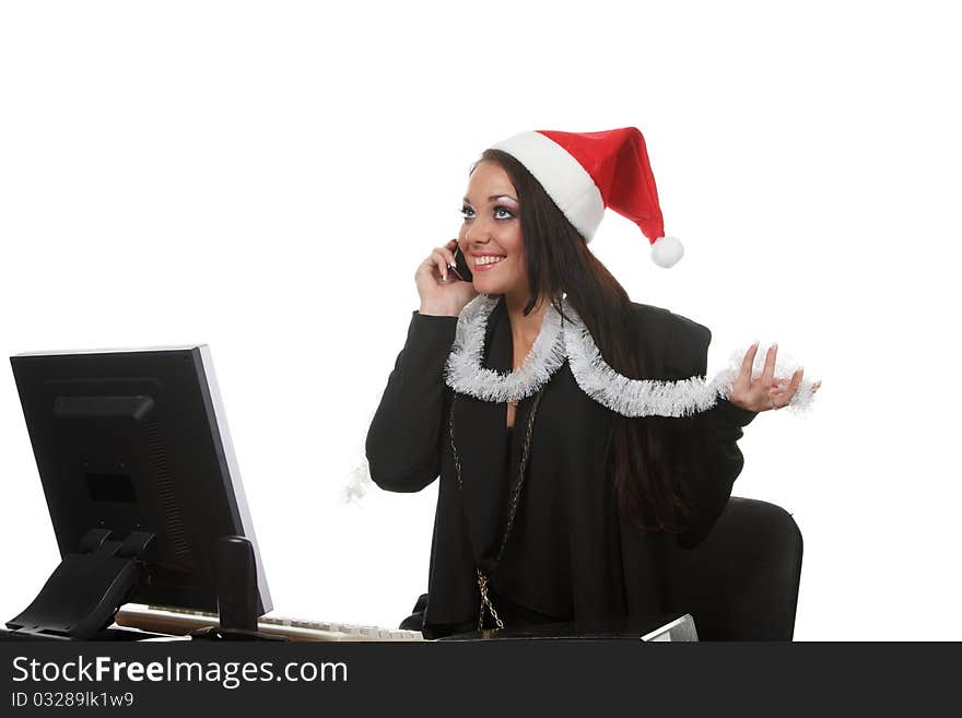 Young businesswoman in a christmas hat