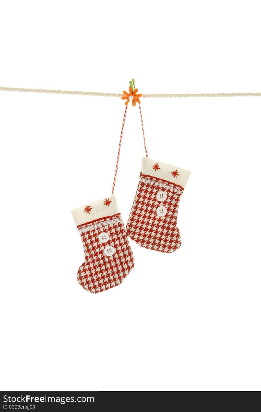 Christmas stockings hanging from a clothesline. Christmas stockings hanging from a clothesline