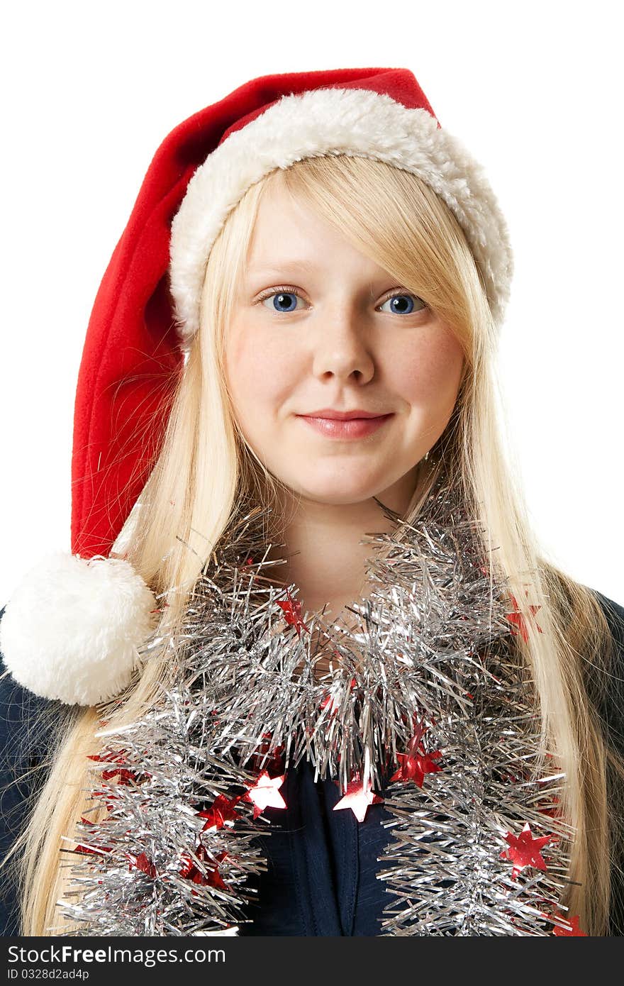 A beautiful young blonde in a Santa hat on a white background