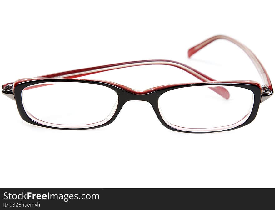 Stylish red glasses on a white background