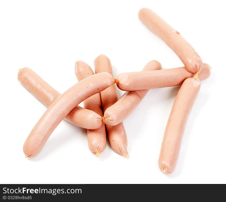 Pile of raw sausages