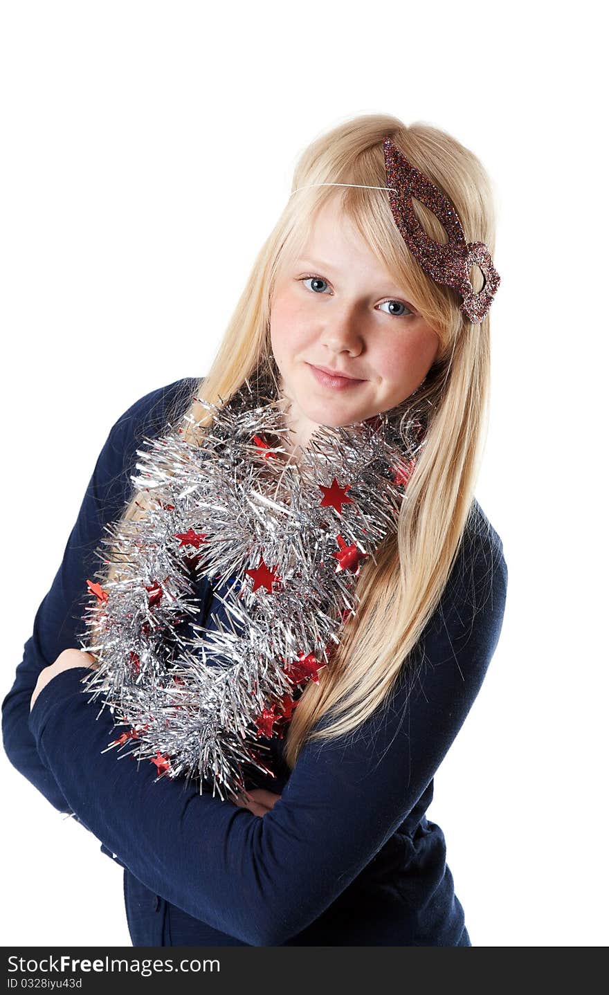 A beautiful young girl in the Christmas tinsel on a white background