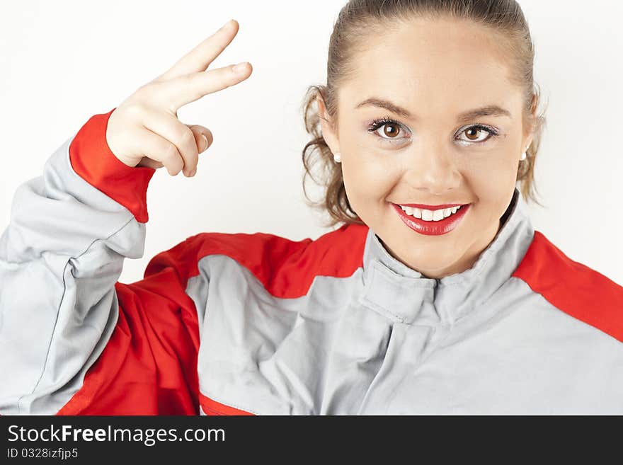 Young happy woman wearing mechanics overalls uniform