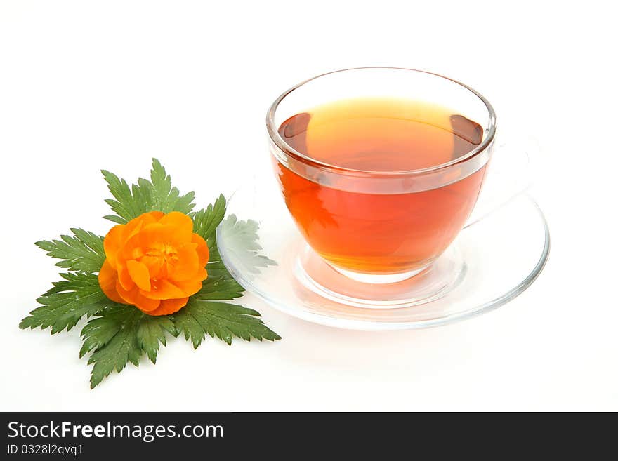 Tea and flower on a white background