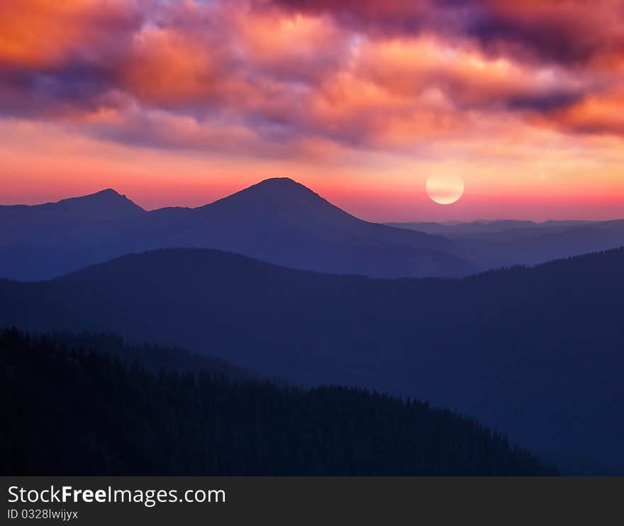 Landscape with a dawn in mountains