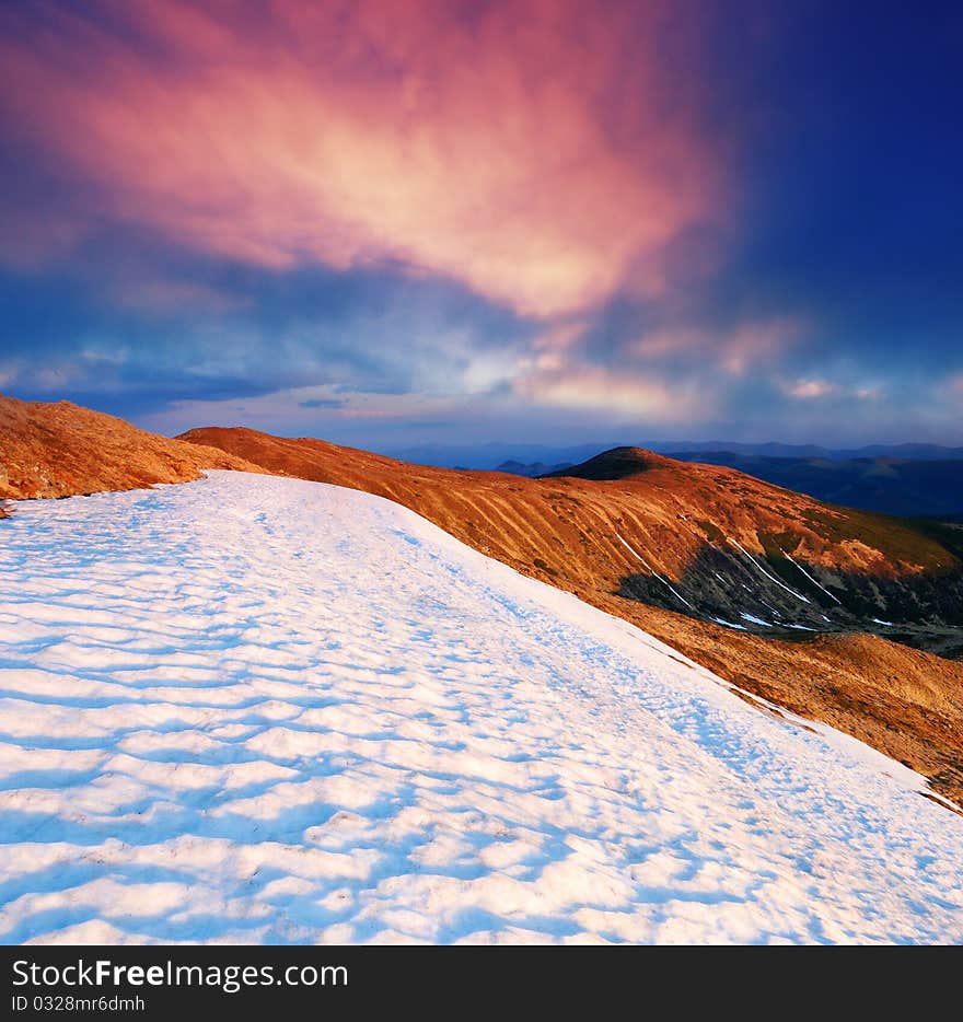 Spring in mountains and last snow. The Ukrainian mountains Carpathians