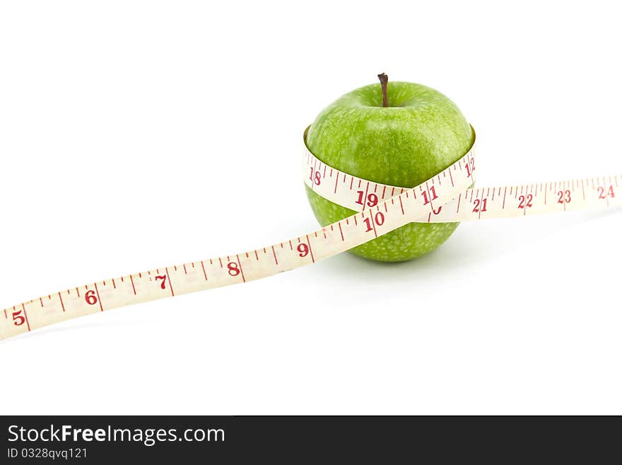 Green apple with tape on white background