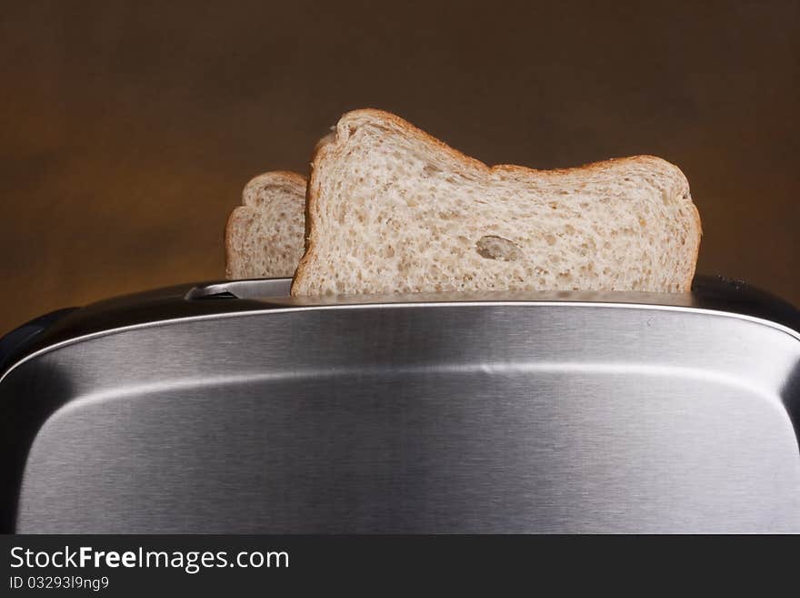 A toaster and a special bread for toast.