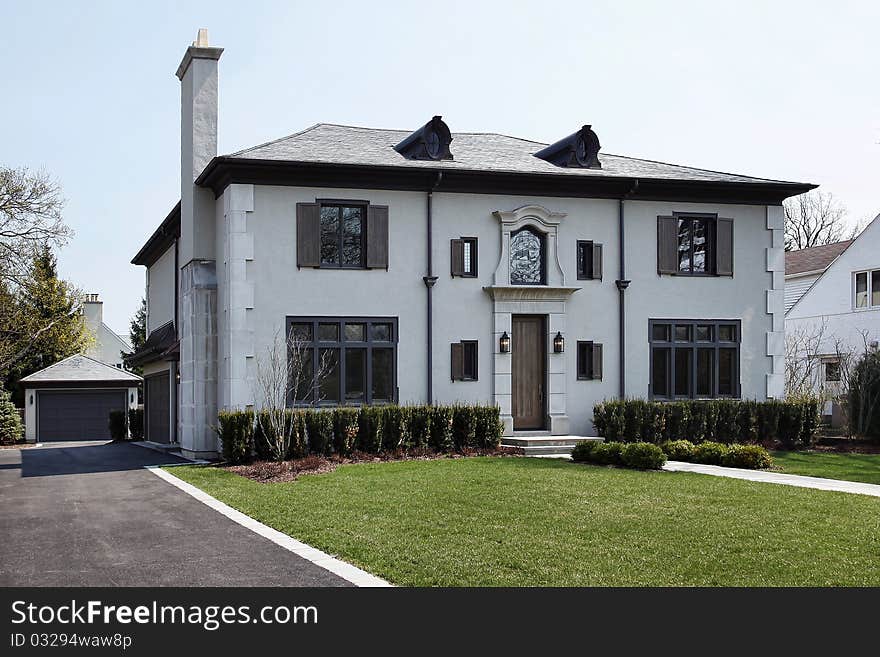 Luxury home with rounded windows on roof. Luxury home with rounded windows on roof