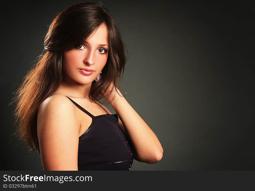 young woman on dark background. young woman on dark background