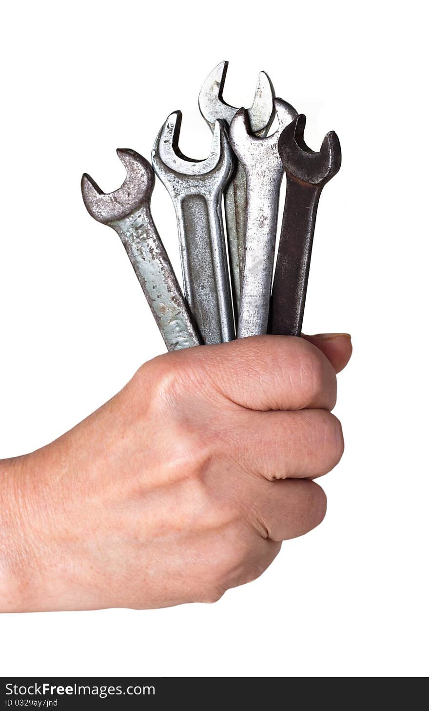 Hand with a old spanner