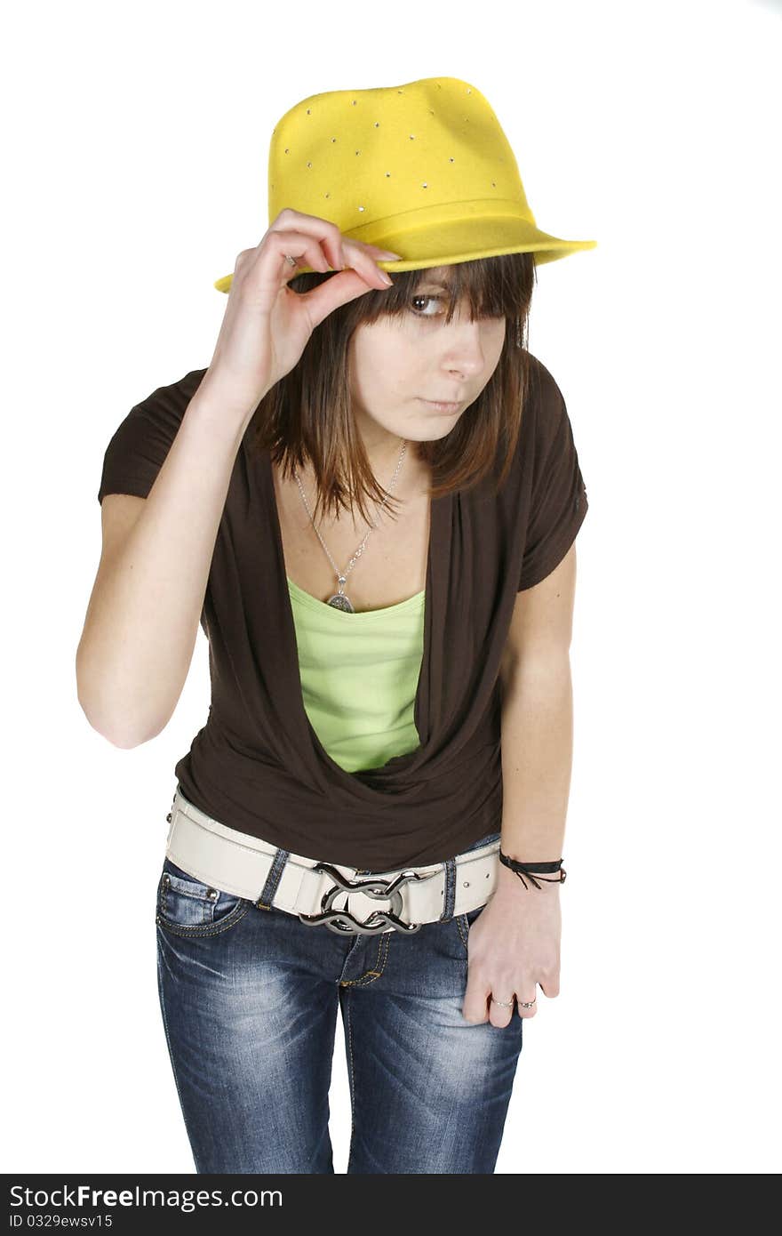 Portrait of stylish young woman in yellow hat isolated on white