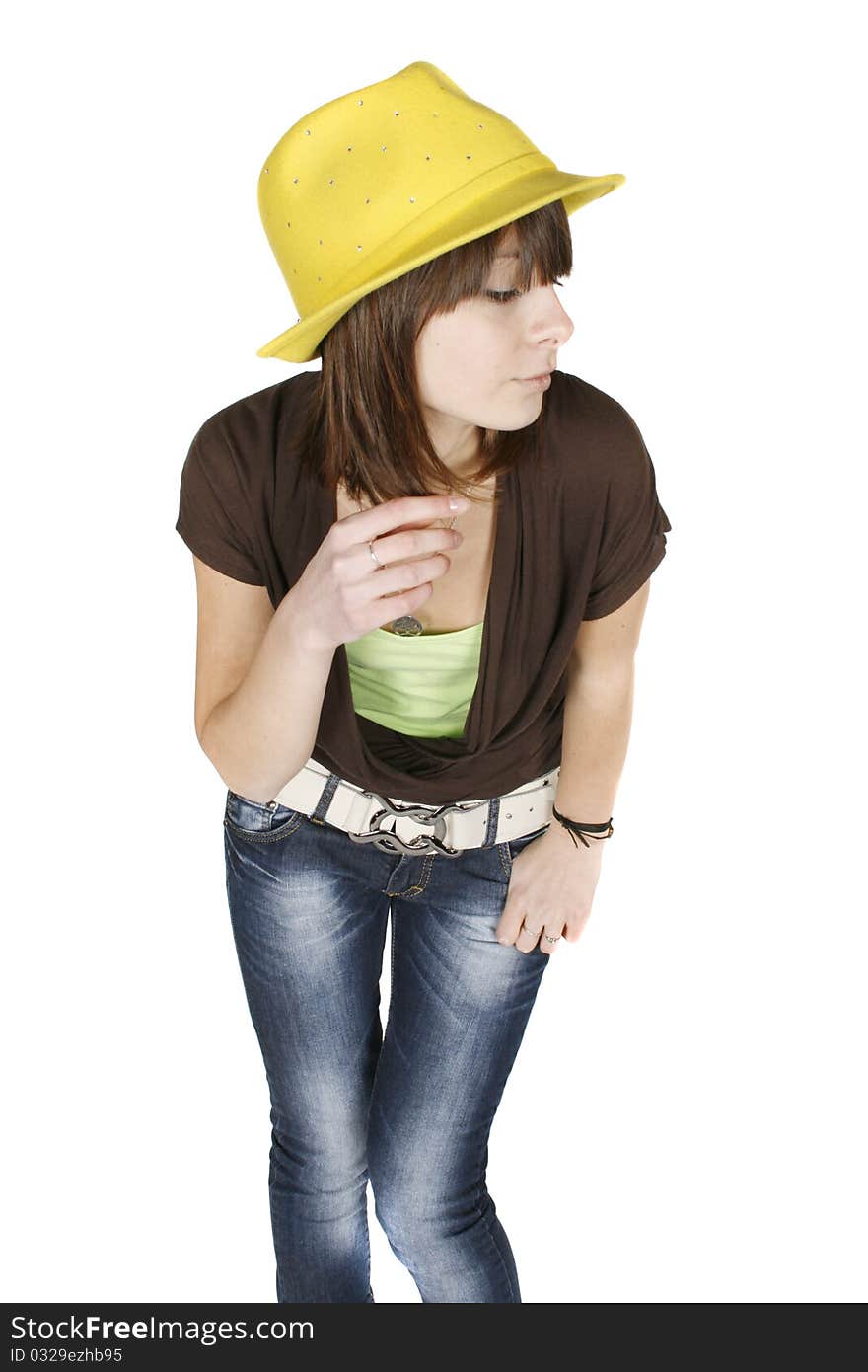 Portrait of stylish young woman in yellow hat isolated on white