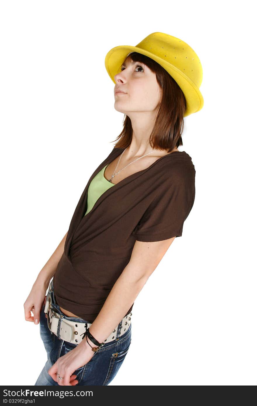 Portrait of stylish young woman in yellow hat isolated on white