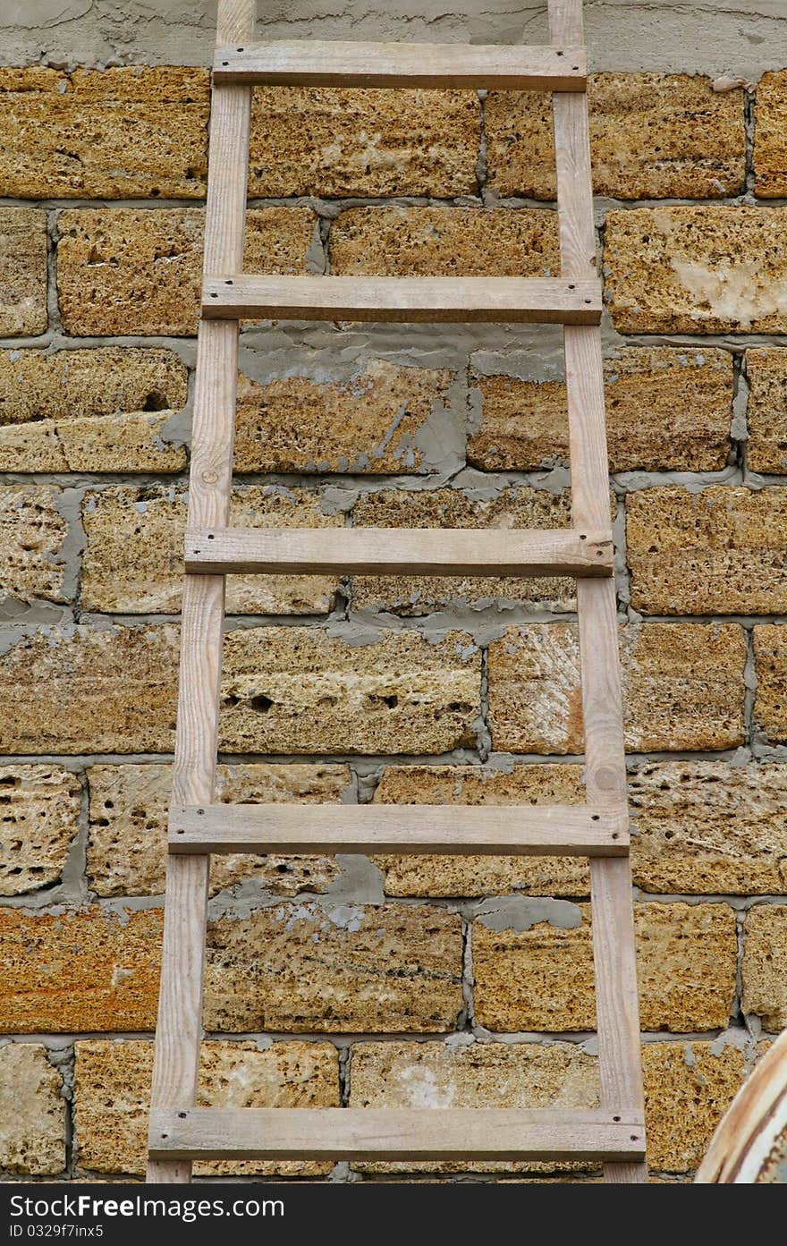 Fragment of brick wall with the stairs