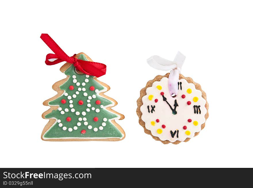 Cookies in the shape of Christmas hours on a white background. Cookies in the shape of Christmas hours on a white background