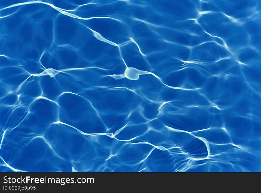 Blue pool texture with water ripples.