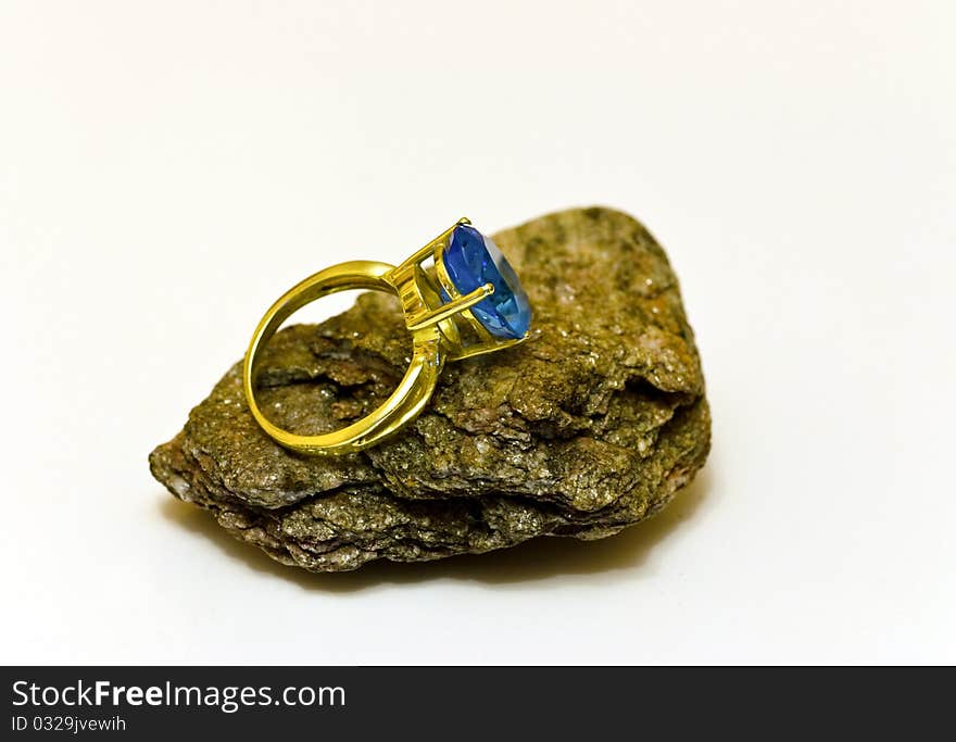 Gold ring with blue topaz gemstone. Gold ring with blue topaz gemstone