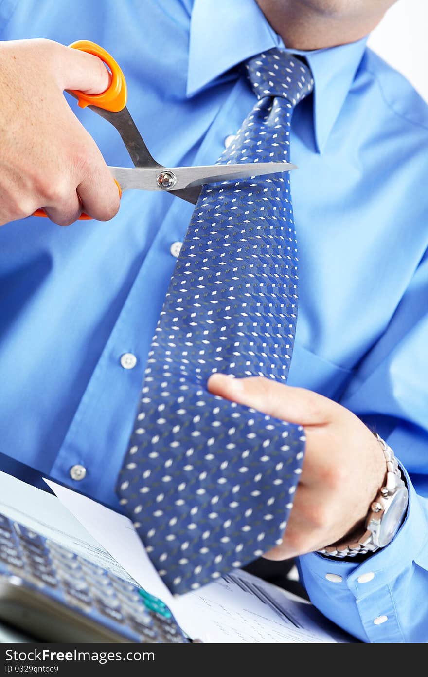 Businessman Cutting The Tie