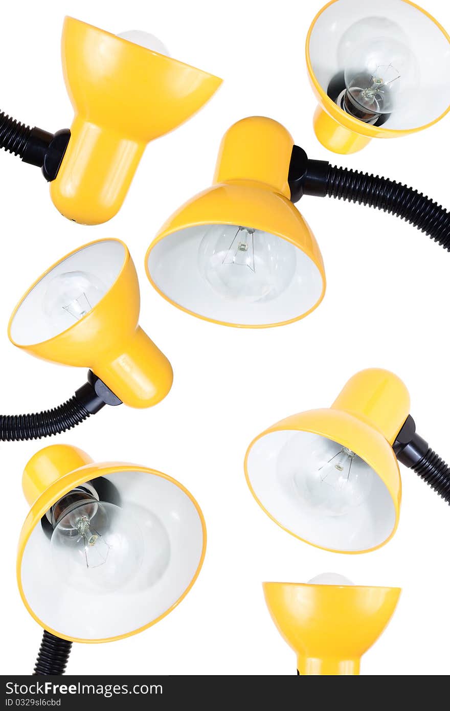 A lot of fun yellow table lamps on a white background. A lot of fun yellow table lamps on a white background