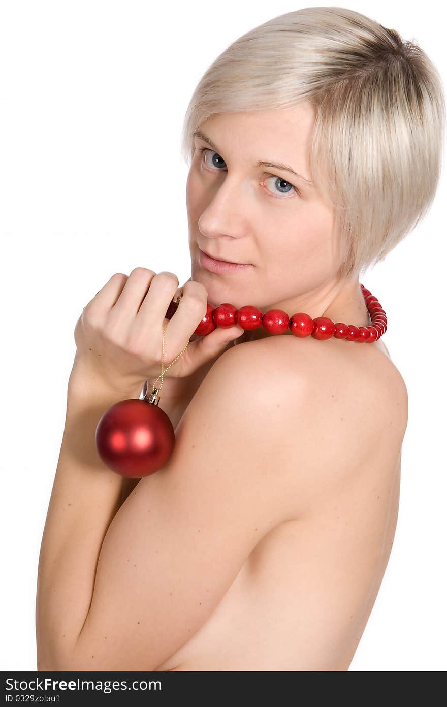 Young Girl With Christmas Ornaments In Studio