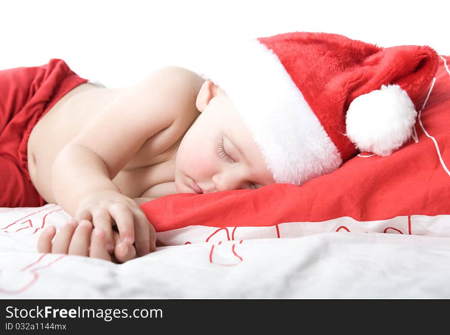 Baby In Christmas Suit Is Sleeping