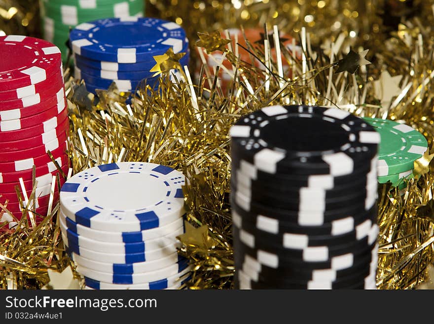 Casino chips bonus in a worm Christmas light and background