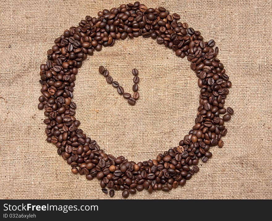 Coffee alarm clock from the grain for background