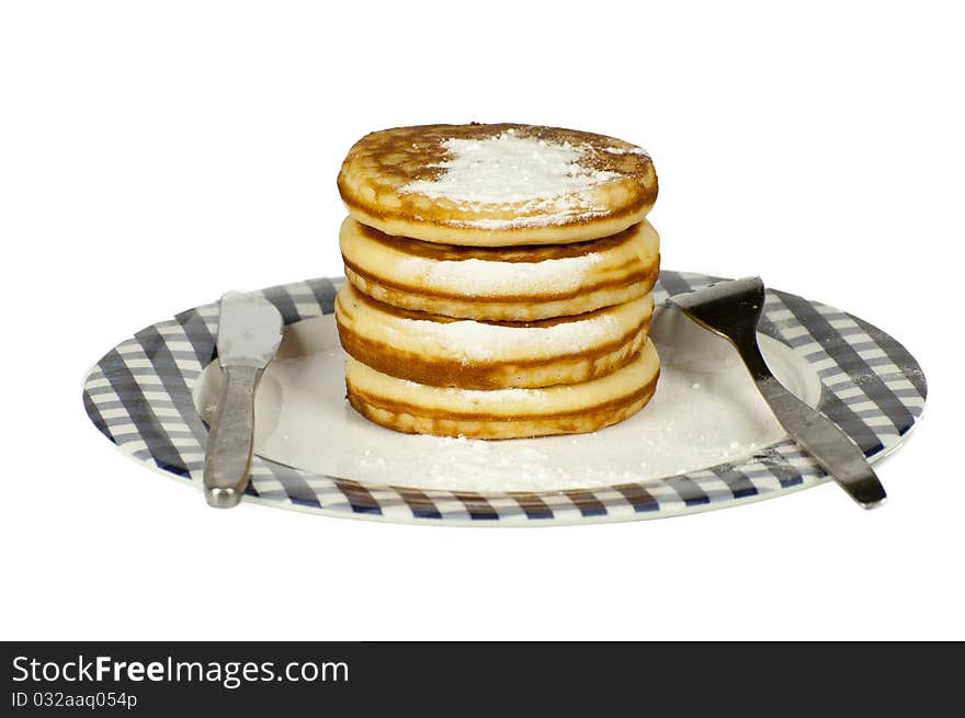 Stack of pancakes isolated on a white background