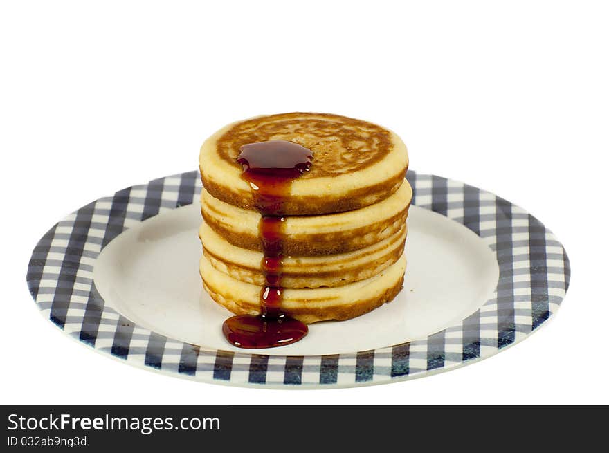 Stack of pancakes isolated on a white background