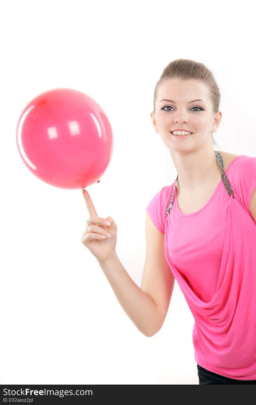 Studio portrait of young happy girl with red balloon over white. Studio portrait of young happy girl with red balloon over white