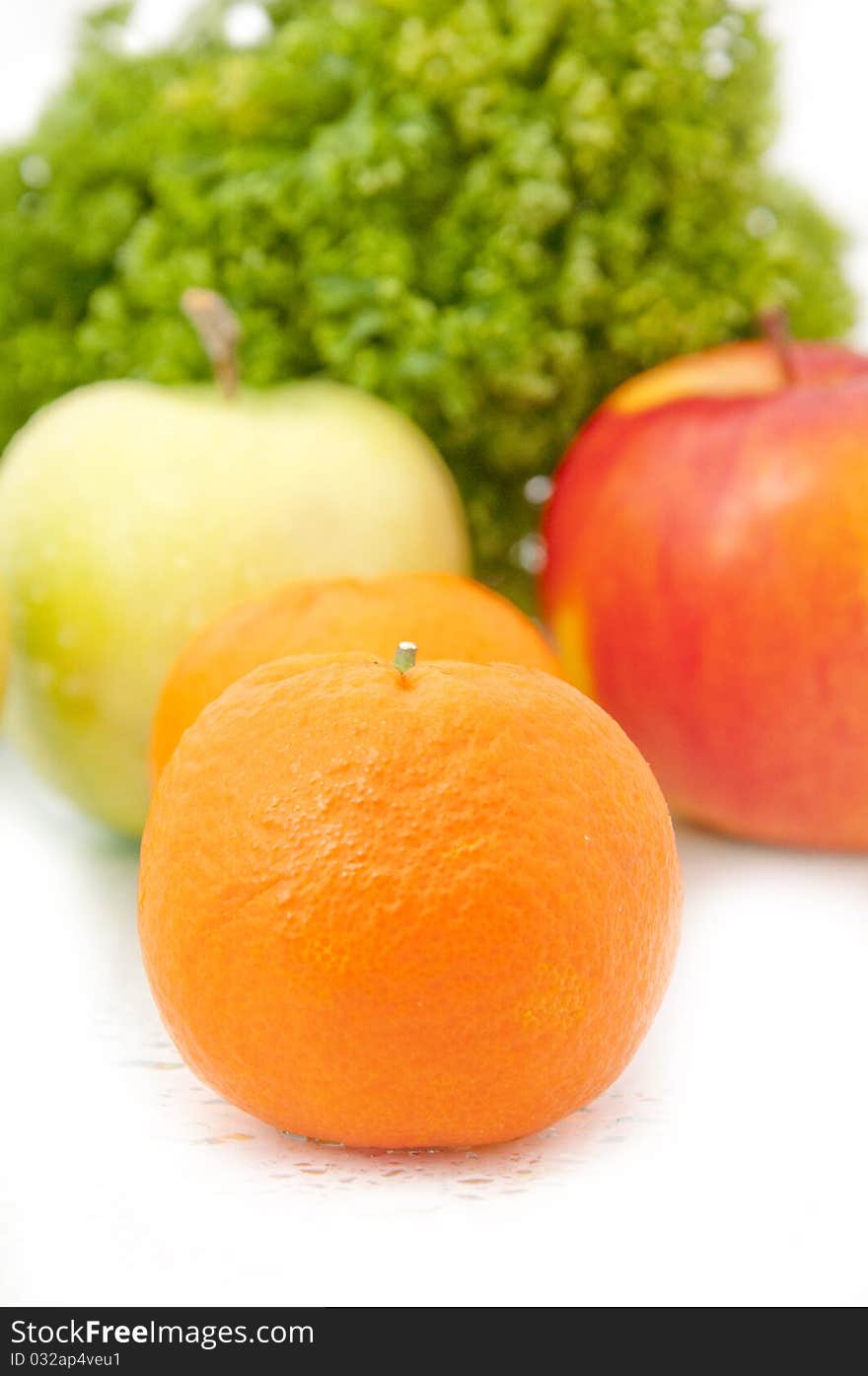 Mandarin with apples in the background. Mandarin with apples in the background